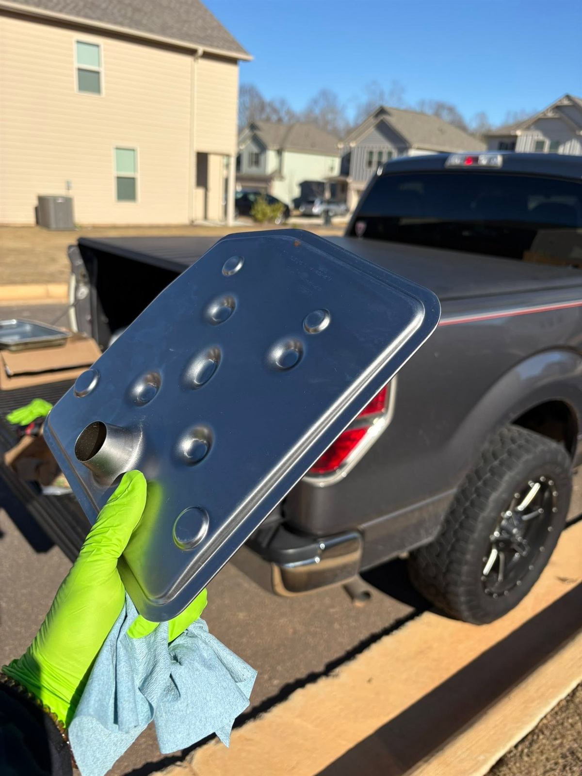 Truck bed cover being fitted